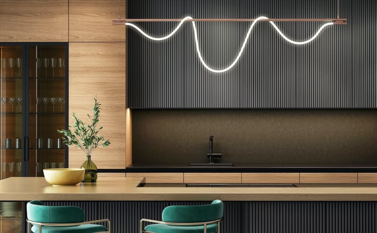 Modern kitchen with unique LED lighting fixture and sleek design.