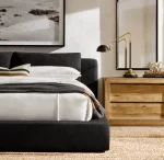 Modern bedroom with Gorvey task table lamp on wooden nightstand.