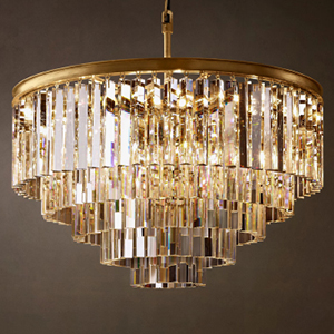 Elegant crystal chandelier by Gorvey Lighting with gold finish and cascading crystals.