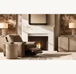 Elegant living room with fireplace and modern lighting fixtures by Gorvey.