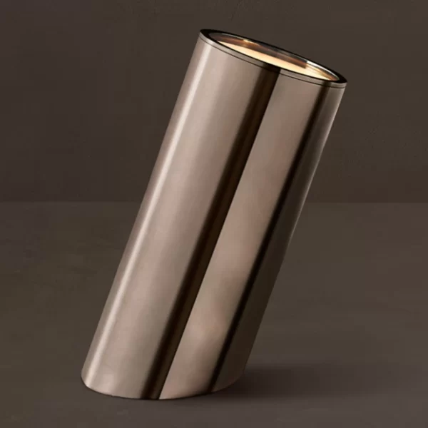Sleek metallic vase with a reflective surface for modern decor.