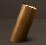 Elegant gold cylindrical lamp by Gorvey Lighting for modern interiors.