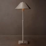 Modern metal shade table lamp with adjustable height and beige lampshade.