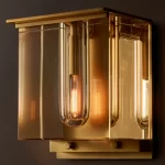Gorvey lighting fixture with a modern gold finish and glass elements.