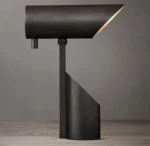 Modern black spotlight with sleek design for interior lighting.