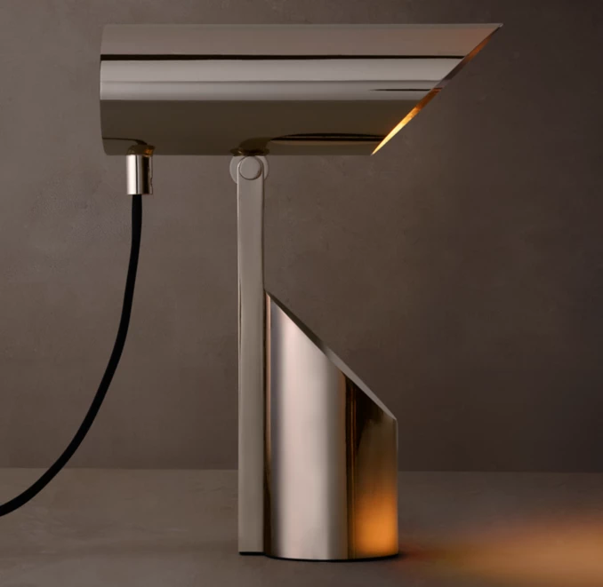 Modern Gorvey spotlight with adjustable arm and sleek design.