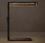 Modern black table lamp with LED light for task lighting.