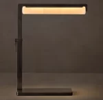 Modern black task table lamp with adjustable arm and warm LED light.