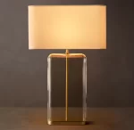 Gorvey Lighting GV Lacour clear glass table lamp with beige shade.