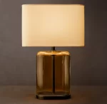 Gorvey Lighting GV Lacour Amber Glass Table Lamp with beige shade.