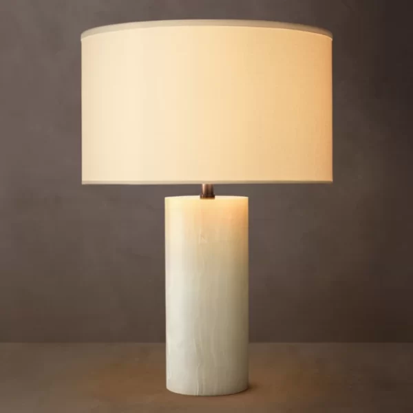 Gorvey Stone Cylindrical Table Lamp with warm light for modern decor.