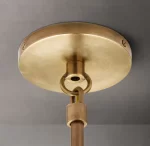 Brass ceiling light fixture with adjustable hanging rod for modern decor.