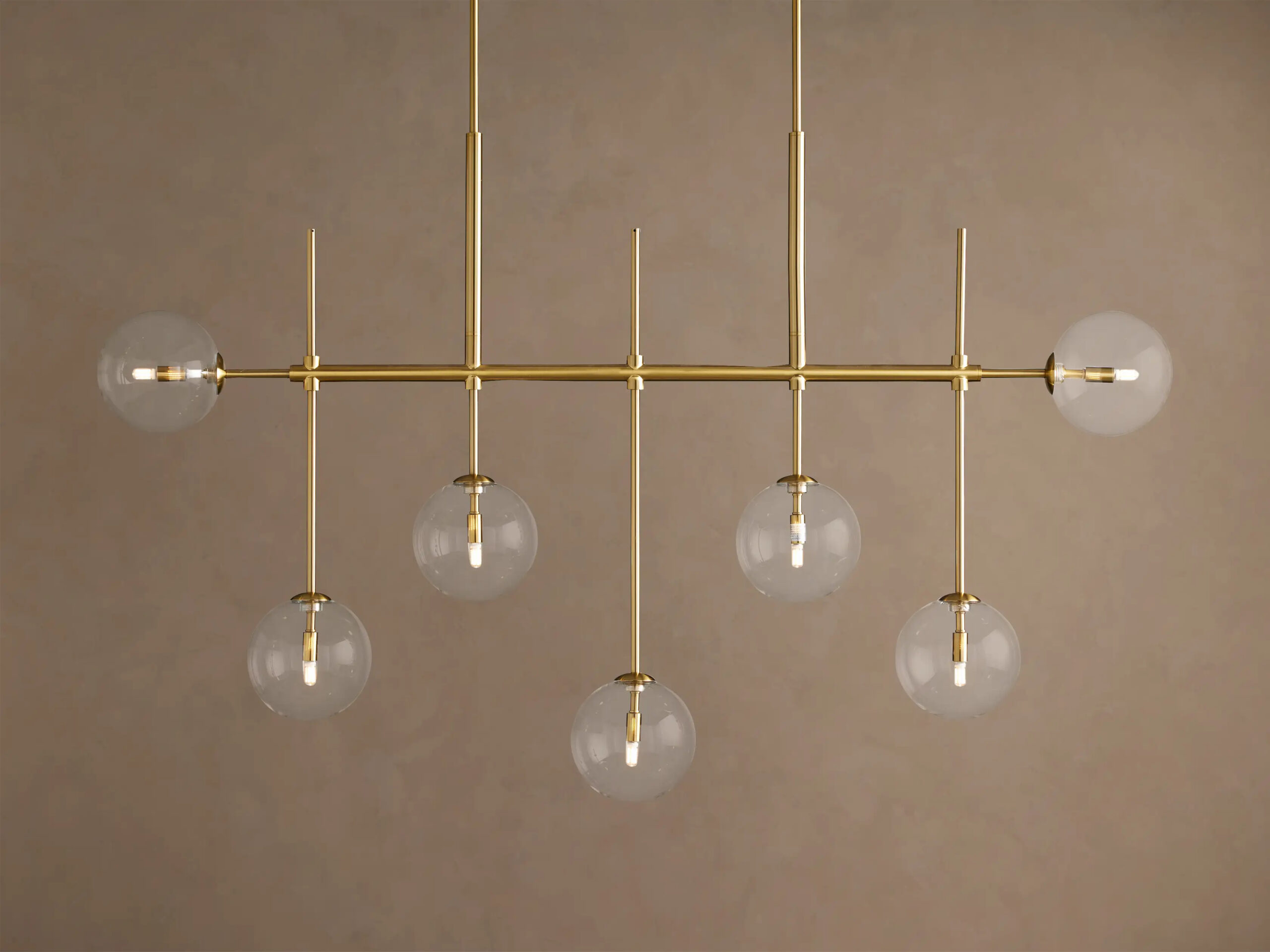662036H239_RB260117 GV Roscoe 60 Inch Brass Linear Light Chandelier - Image 1