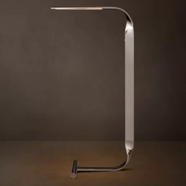 Modern LED desk lamp with sleek metallic design for stylish lighting.