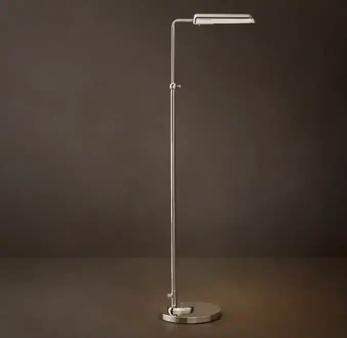Modern LED floor lamp with adjustable arm and sleek design for home lighting.