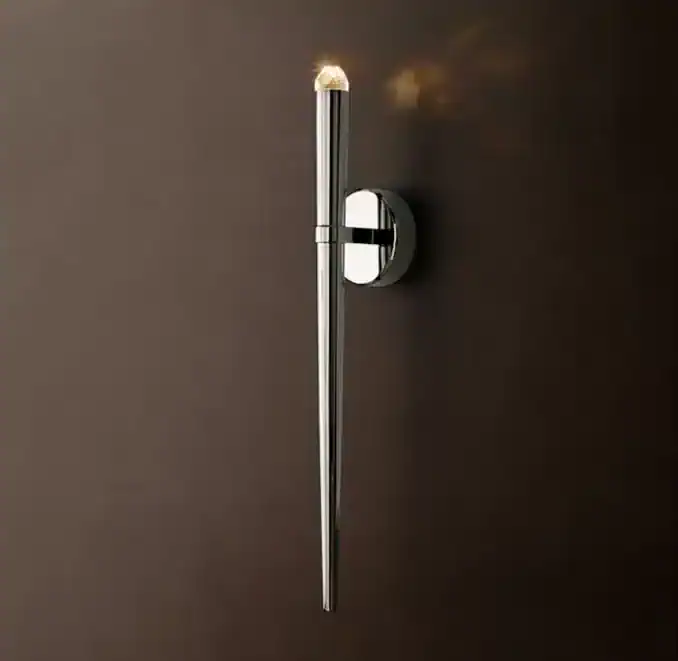 Modern wall-mounted LED light fixture with sleek design and warm glow.