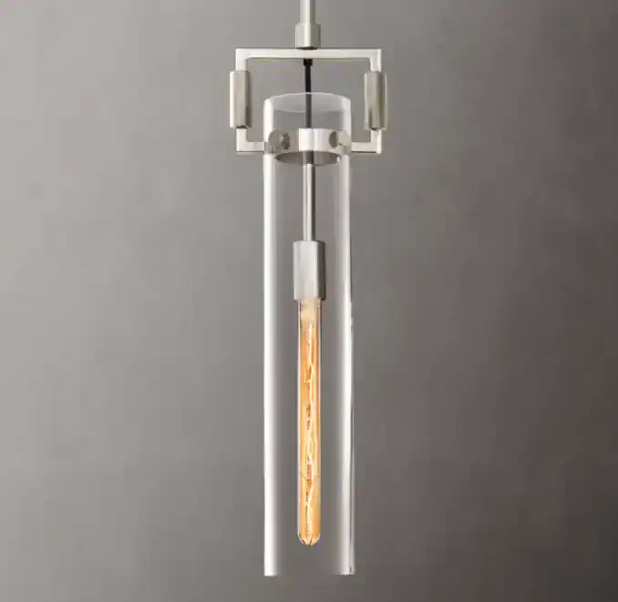Contemporary pendant light with sleek white frame and Edison-style bulb.