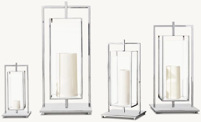 Elegant modern candle holders by Gorvey Lighting with sleek geometric design.