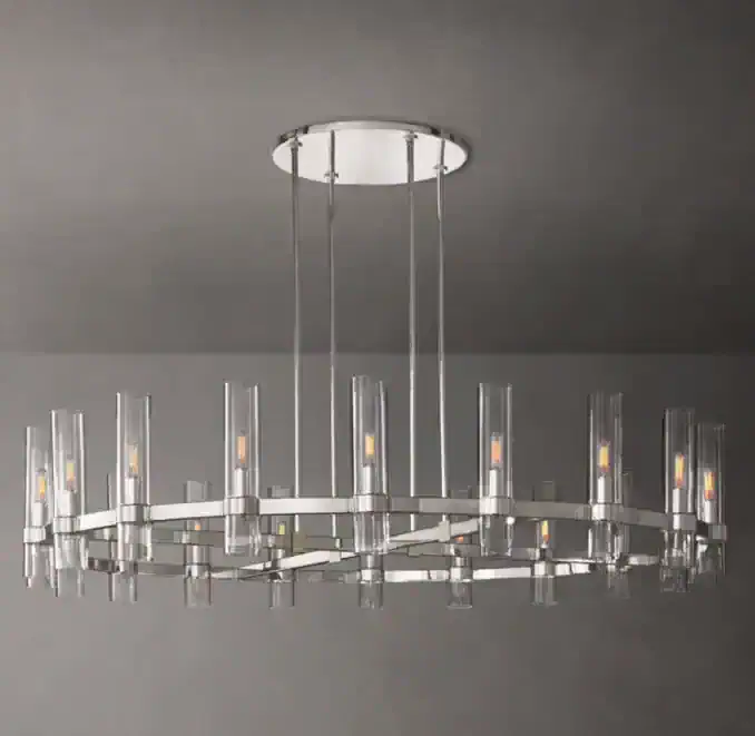 Elegant modern chandelier with glass and metal design by Gorvey Lighting.