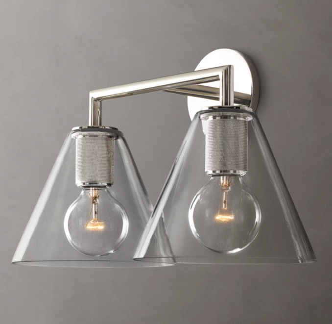 Contemporary wall-mounted Gorvey lighting with glass shades and LED bulbs.