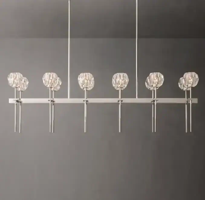 Elegant modern chandelier with crystal accents and sleek metal design.