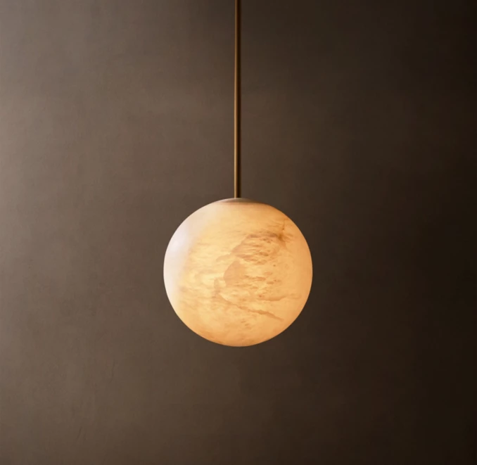 Elegant spherical pendant lamp by Gorvey Lighting for modern interiors.