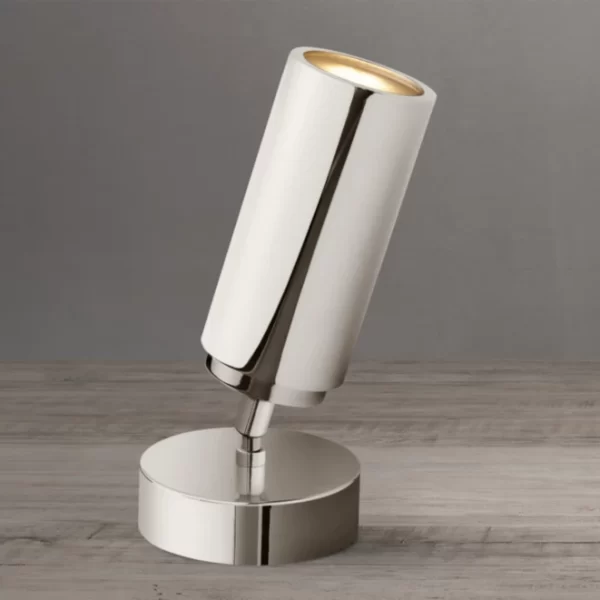 Contemporary white LED desk lamp with adjustable tilt for modern workspace.