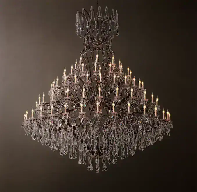 Elegant crystal chandelier with multiple candle-style lights for luxurious decor.