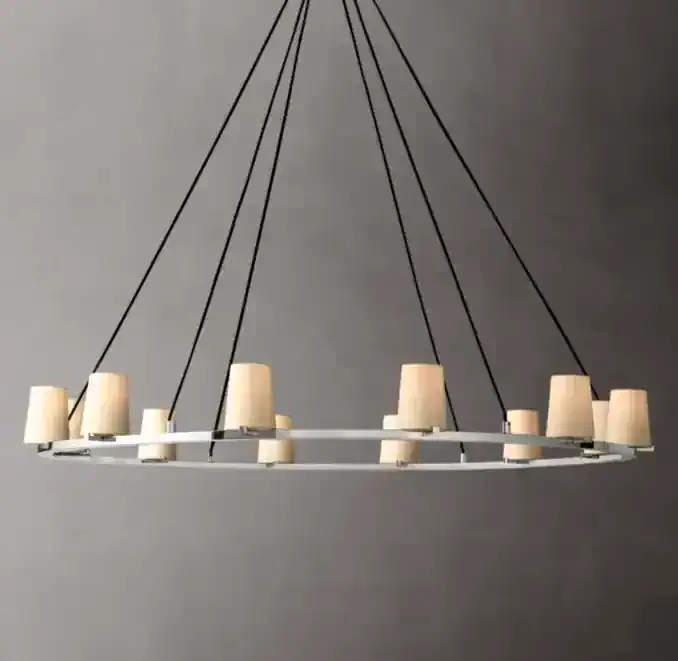Contemporary chandelier with multiple beige lampshades and black cords.
