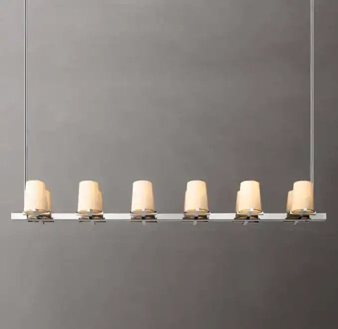Contemporary chandelier with six white glass shades and sleek metal design.