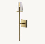Modern gold wall sconce with glass shade for elegant lighting.
