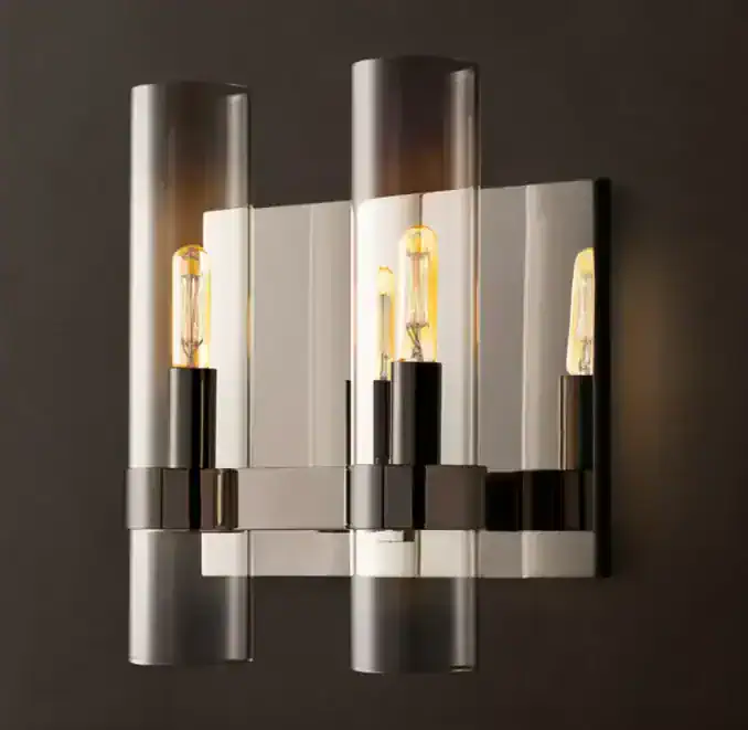 Contemporary wall light fixture with glass tubes and Edison bulbs for stylish lighting.