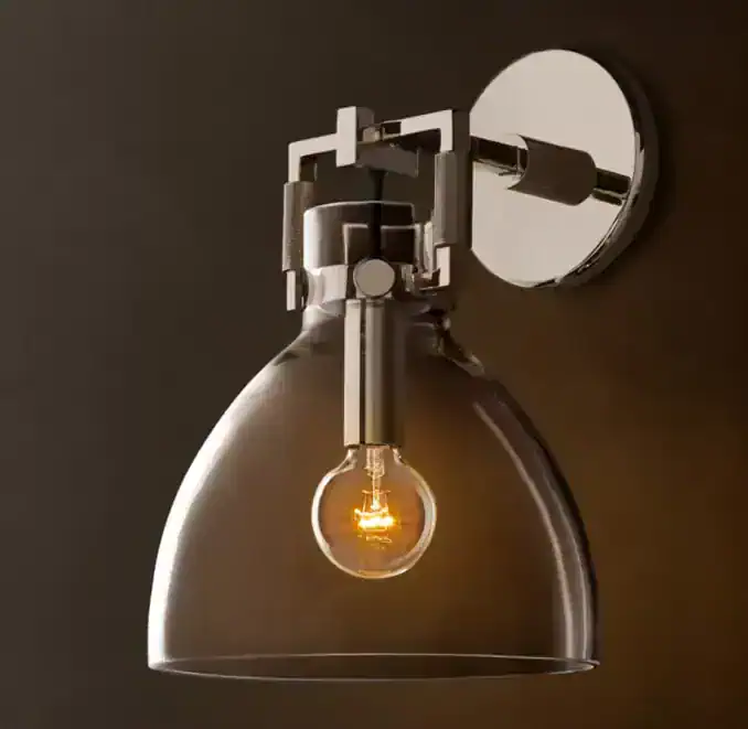 Contemporary wall-mounted lamp with exposed bulb for stylish lighting.