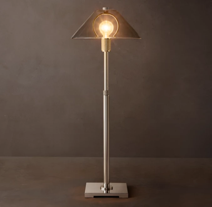 Modern Gorvey lighting floor lamp with exposed bulb and sleek design.