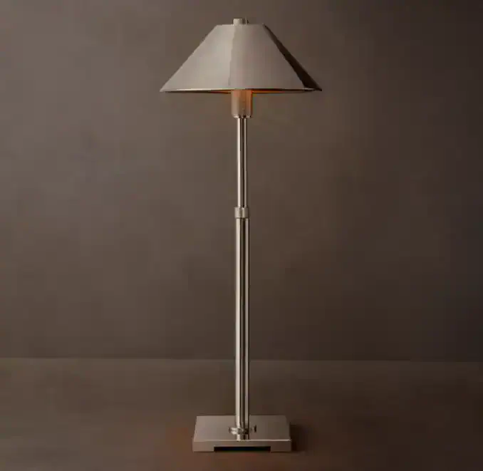 Modern Gorvey lighting floor lamp with beige lampshade and metal stand.