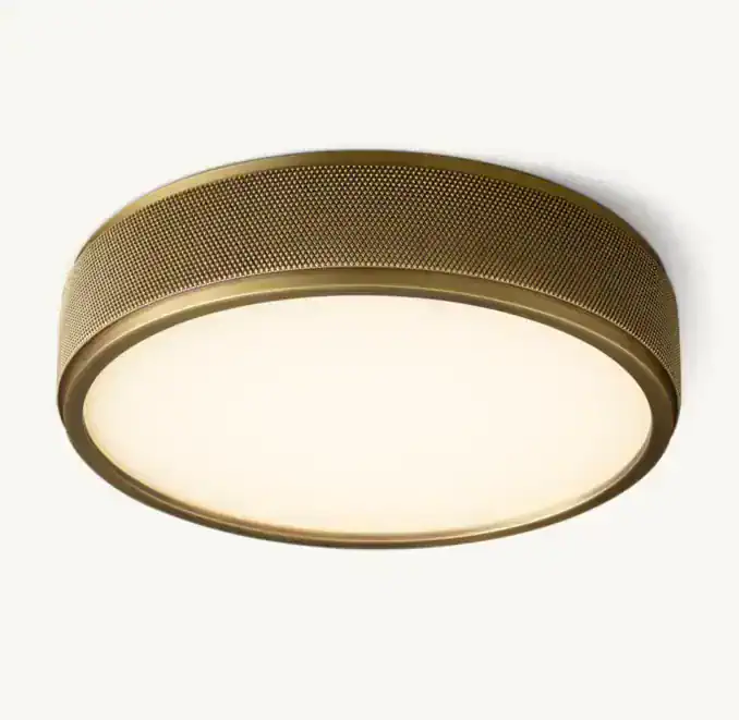 Modern ceiling light fixture with gold finish and diffused LED illumination.