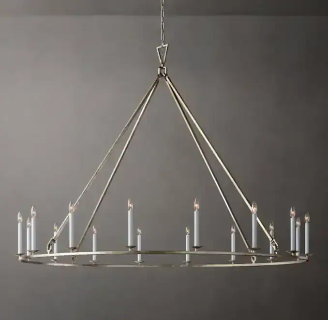 Elegant chandelier with candle-style lights for sophisticated interiors.