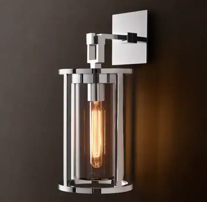 Contemporary wall-mounted lamp with Edison bulb and sleek design.