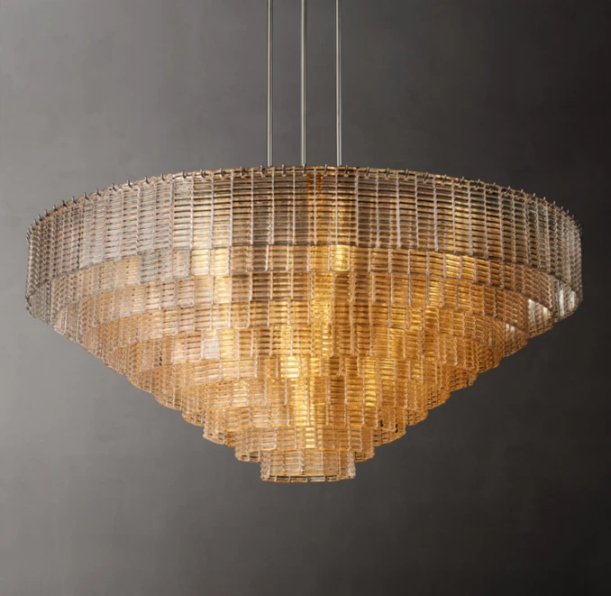 Elegant gold chandelier by Gorvey Lighting for modern interiors.