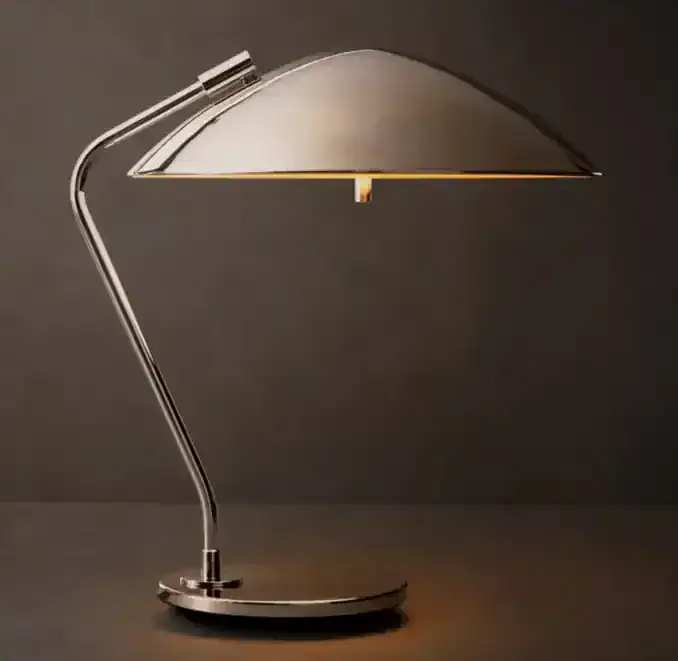 Elegant modern desk lamp with sleek metallic design and adjustable arm.