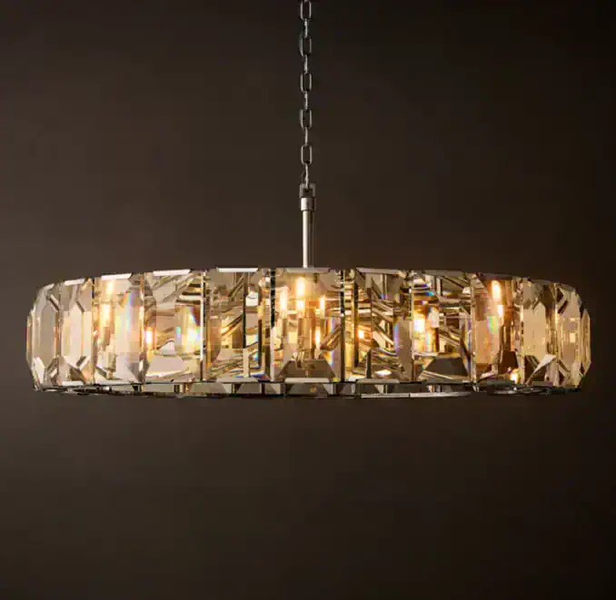 Elegant crystal chandelier by Gorvey Lighting with warm illumination.