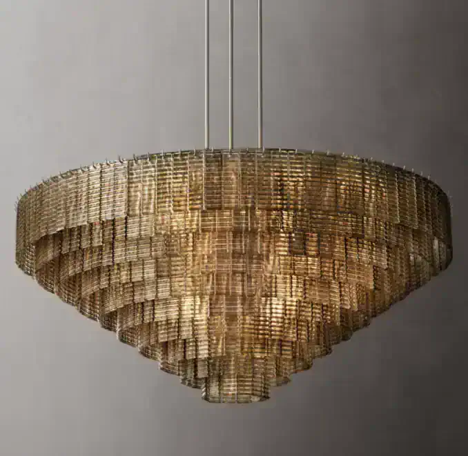 Elegant gold chandelier by Gorvey Lighting for luxury interior decor.