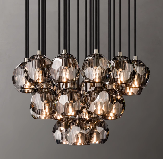 Elegant crystal chandelier with multiple glass pendants for modern interiors.