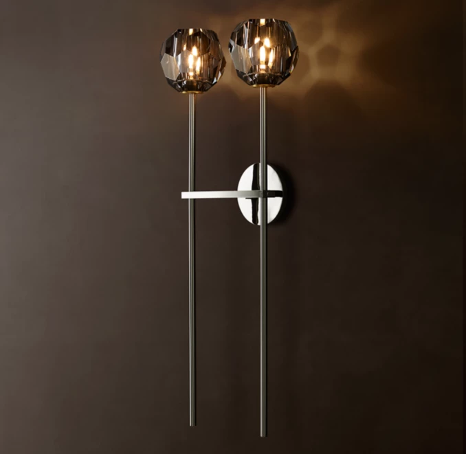 Elegant modern wall sconces with metallic finish for stylish lighting.