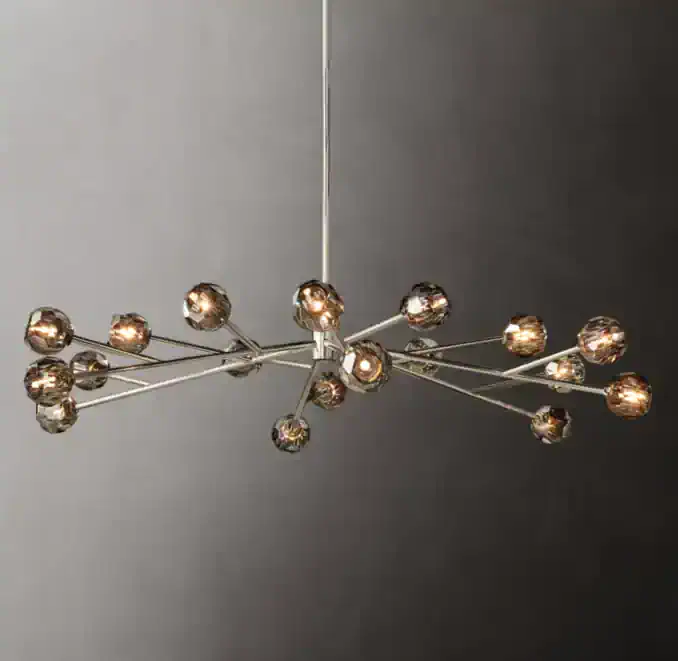 Contemporary chandelier with multiple metallic bulbs and sleek design.