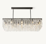 Elegant crystal chandelier by Gorvey Lighting with modern design.
