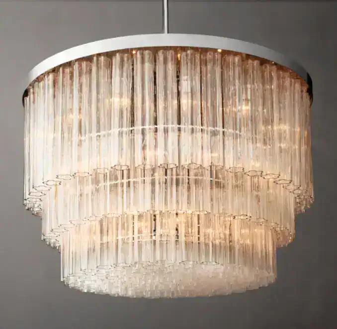 Luxurious crystal chandelier by Gorvey Lighting with multiple tiers of hanging crystals.