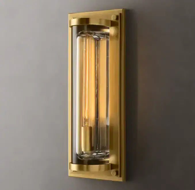 Elegant modern wall sconce by Gorvey Lighting with gold finish and glass tube design.