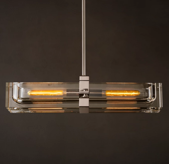 Contemporary pendant light with glass and LED illumination for modern interiors.