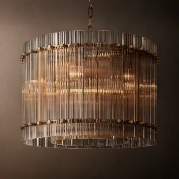 Elegant modern chandelier with vertical glass rods and warm lighting.